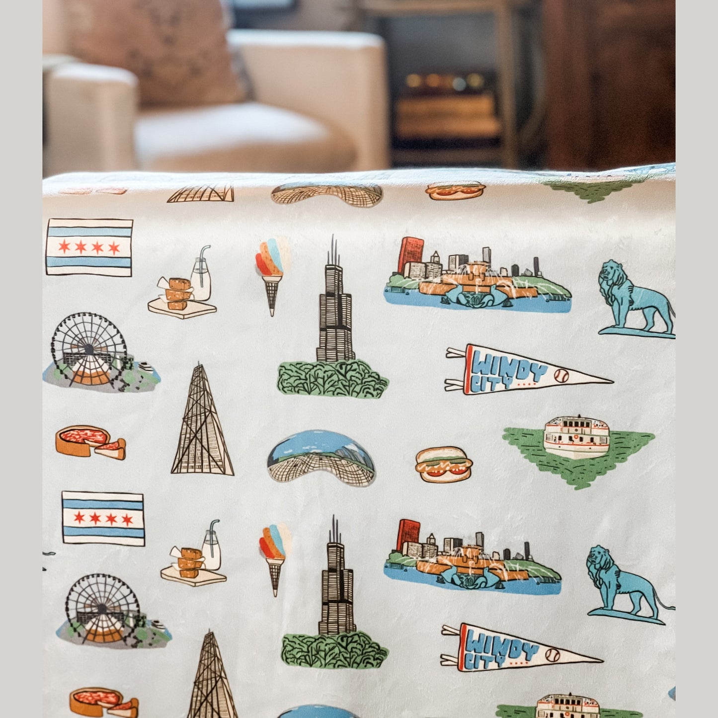 Cozy Chicago-themed plush throw blanket, 60x80 inches, featuring iconic skyline and landmarks in vibrant colors.