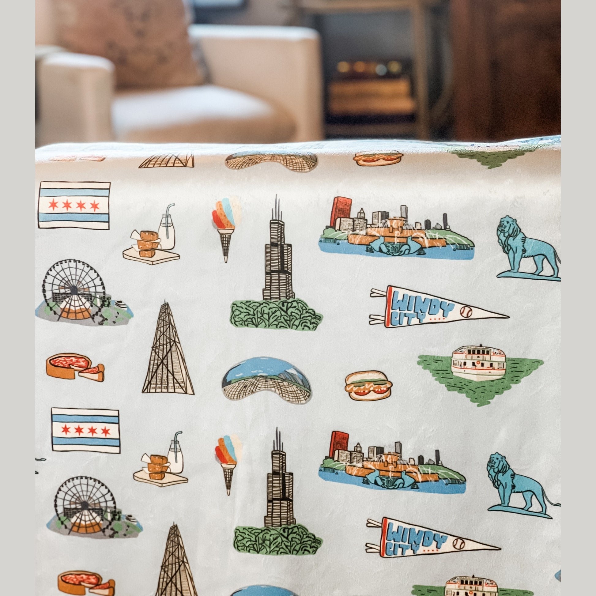 Cozy Chicago-themed plush throw blanket, 60x80 inches, featuring iconic skyline and landmarks in vibrant colors.