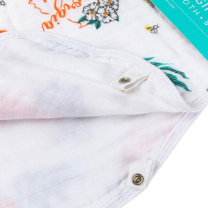 Baby bib and burp cloth set with "Georgia Girl" text, featuring pink and white floral patterns on soft fabric.