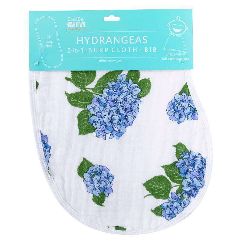 Baby bib and burp cloth set with blue hydrangea print, neatly folded on a white background.