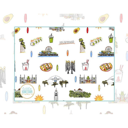 Los Angeles-themed baby bib and burp cloth set featuring iconic city landmarks in vibrant, playful illustrations.