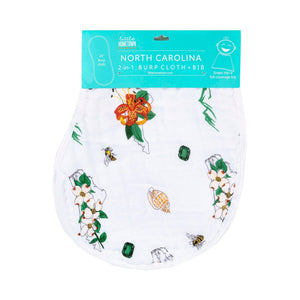 Baby bib and burp cloth set with North Carolina floral design, featuring vibrant flowers and state outline.
