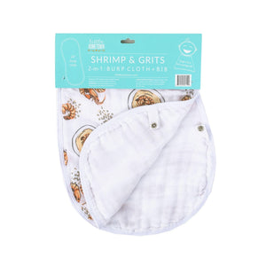 Baby bib and burp cloth set with playful shrimp and grits pattern, featuring pastel colors and soft fabric.