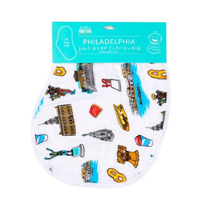 Baby burp cloth and wraparound bib set with Philadelphia landmarks, featuring soft fabric and vibrant city icons.