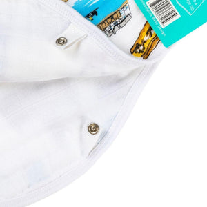 Smiling baby wearing a Philadelphia-themed bib and burp cloth, featuring iconic city landmarks and symbols.