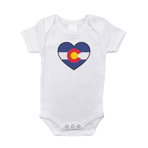 White baby onesie with "Colorado" and a mountain graphic in blue, featuring "Little Hometown" text below.