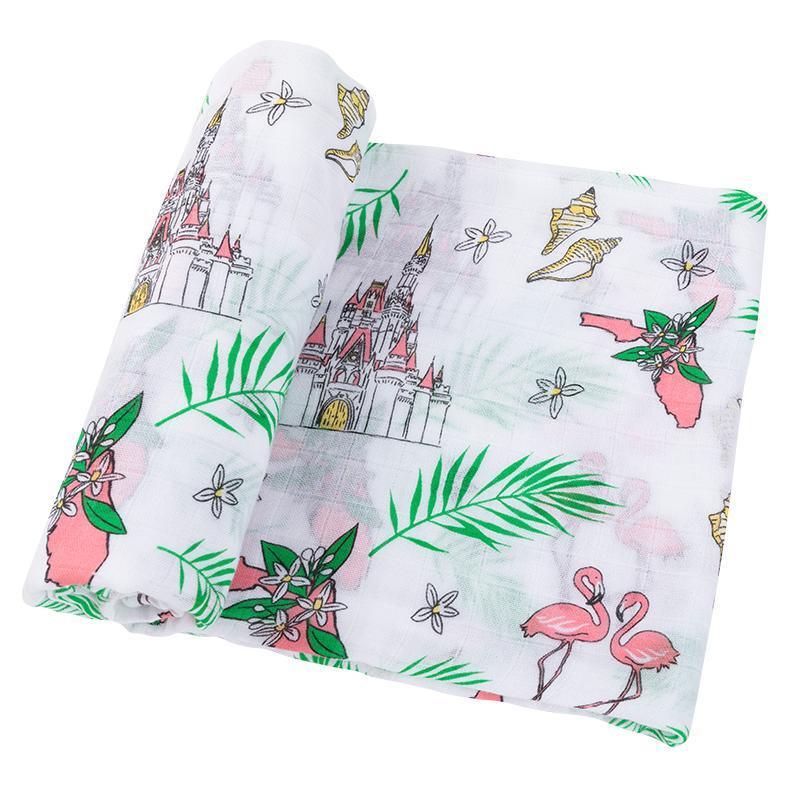 Soft muslin swaddle blanket with vibrant Florida-themed floral print, featuring pink hibiscus and green leaves.