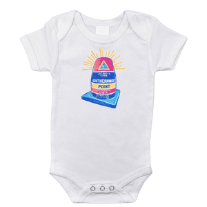 White baby onesie with "Key West, Florida" and a colorful sunset graphic, featuring palm trees and ocean waves.