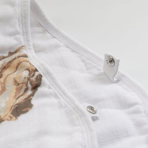 Baby gift set with oyster-themed muslin swaddle blanket and burp cloth/bib combo, featuring cute oyster illustrations.