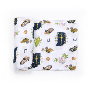Indiana-themed baby gift set with muslin swaddle blanket and burp cloth, featuring state icons and landmarks.