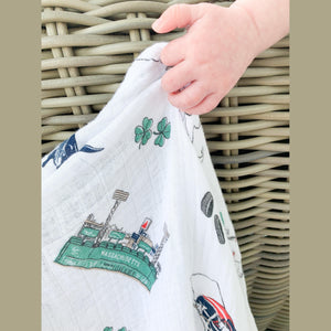 Massachusetts-themed baby gift set with muslin swaddle blanket and burp cloth/bib combo, featuring state icons.