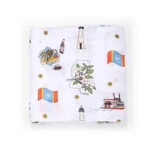 Mississippi-themed muslin swaddle and burp cloth set featuring state icons and landmarks in soft pastel colors.