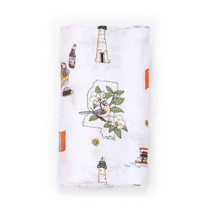 Mississippi-themed muslin swaddle and burp cloth set featuring state icons and landmarks in soft pastel colors.