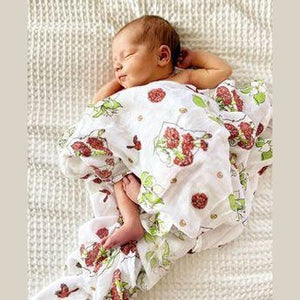 Ohio-themed baby gift set with floral muslin swaddle, receiving blanket, and burp bib, all in soft pastel colors.