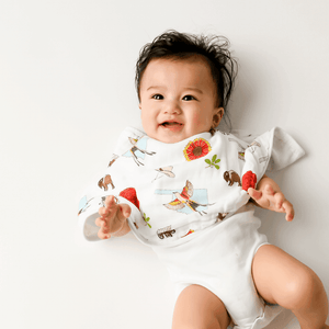 Oklahoma-themed swaddle blanket and burp cloth set featuring state icons, landmarks, and vibrant colors.