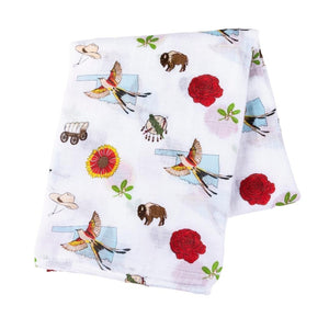 Oklahoma-themed baby gift set with swaddle blanket, burp cloth, and bib featuring state icons and landmarks.