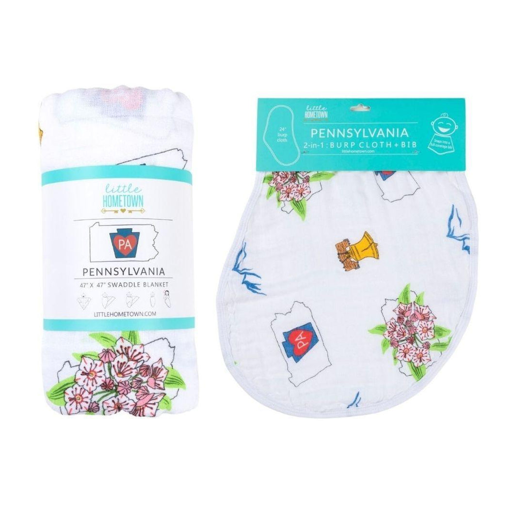 Pennsylvania-themed baby gift set with muslin swaddle blanket and burp cloth/bib combo, featuring state icons.