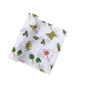 South Carolina-themed baby gift set with muslin swaddle blanket and burp cloth, featuring state icons and text.