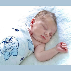 Southern Gentleman baby gift set with muslin swaddle blanket and burp cloth/bib combo, featuring a bow tie design.