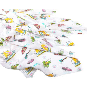 Floral-themed muslin swaddle blanket and burp cloth set with "Tennessee Baby" text, neatly folded on a white background.