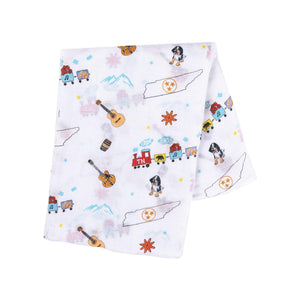 Tennessee-themed baby gift set with muslin swaddle blanket and burp cloth/bib combo, featuring state icons.