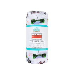 Washington D.C. baby gift set with muslin swaddle blanket and burp cloth, featuring iconic city landmarks.