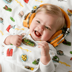 Pittsburgh-themed baby gift set with a muslin swaddle blanket and burp cloth, featuring city landmarks and icons.