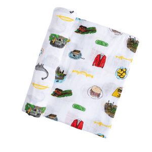 Pittsburgh-themed baby gift set with a muslin swaddle blanket and burp cloth, featuring city landmarks and icons.