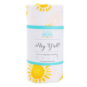 White muslin swaddle blanket with "Hey Y'all" text in playful script, featuring a light blue and white striped background.
