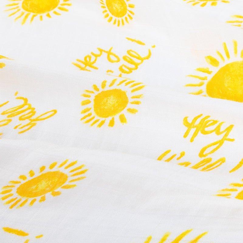 White muslin swaddle blanket with "Hey Y'all" text in playful script, featuring a light blue and white striped pattern.
