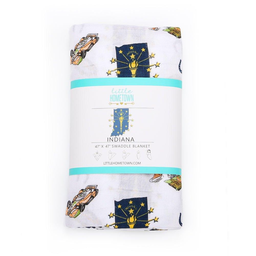 White muslin swaddle blanket with Indiana state map, featuring landmarks, animals, and 