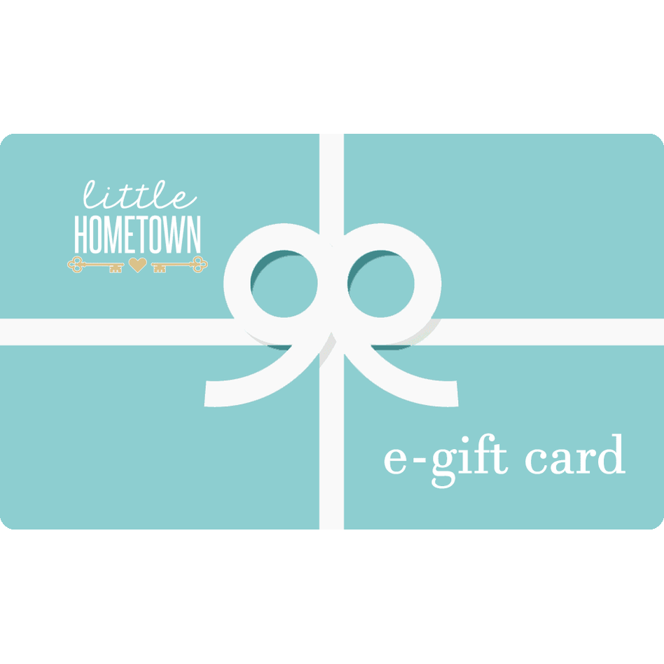 Little Hometown gift card with pastel illustrations of a house, tree, and sun, set against a white background.