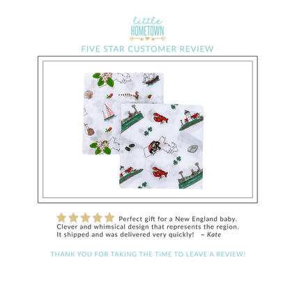 Massachusetts-themed baby muslin swaddle blanket with state icons like lobsters, lighthouses, and sailboats.