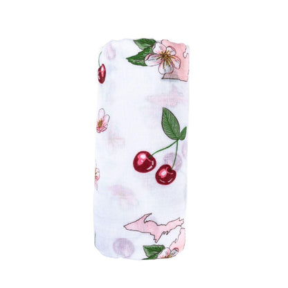 White muslin swaddle blanket with colorful floral patterns and "Michigan" text, laid flat on a white background.