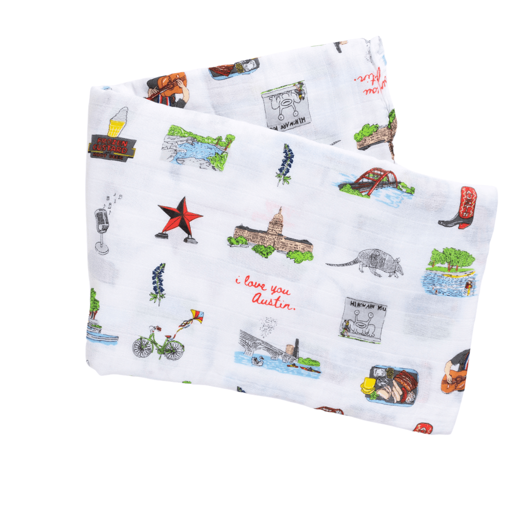White muslin baby swaddle blanket with colorful Austin-themed illustrations, including landmarks and icons.