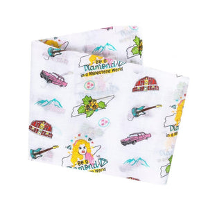 Soft muslin swaddle blanket with delicate floral pattern, featuring "Tennessee Baby" text in elegant script.