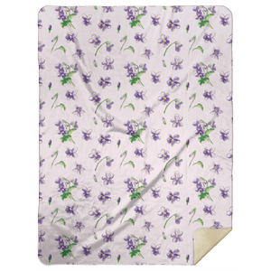 Soft plush throw blanket with a pattern of delicate violets and green leaves on a white background, 60x80 inches.